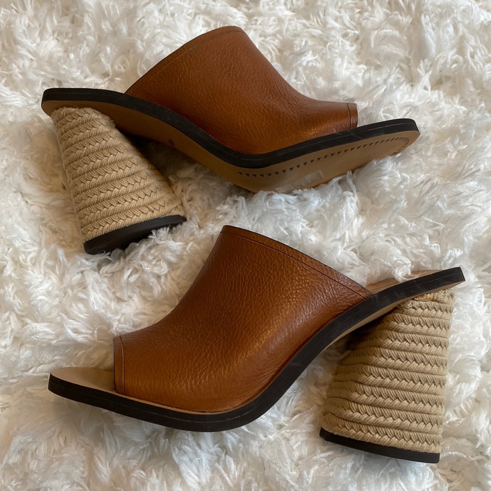 NWOT! Super cute slip on heels with straw heel. Stickers still on bottom.